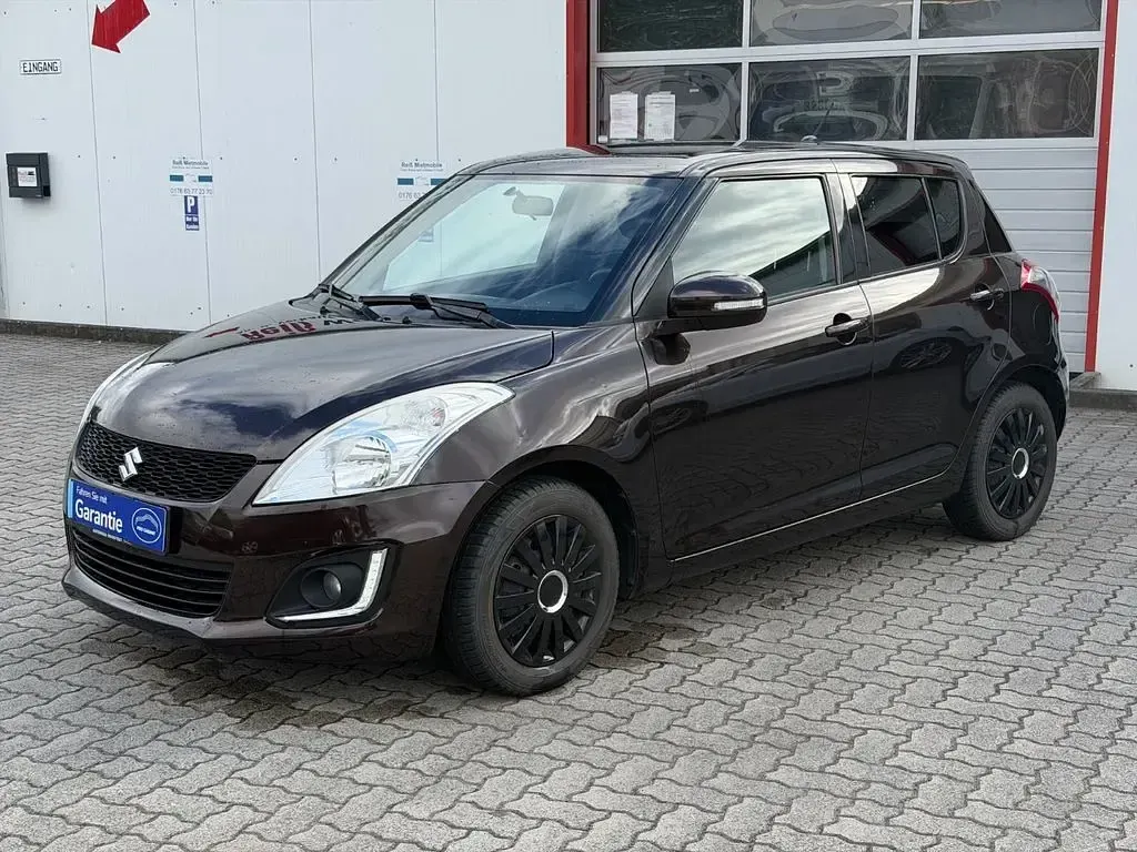 Gebraucht Suzuki Swift Comfort 94 PS (69 kW) 2015 Braun Kleinwagen