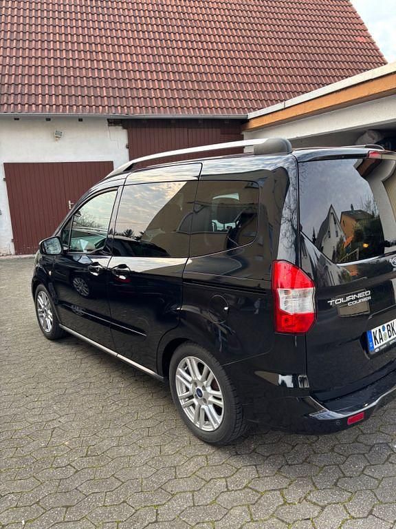 Gebraucht Ford Tourneo Courier Titanium 101 PS (74 kW) 2015 Schwarz Van / Kleinbus