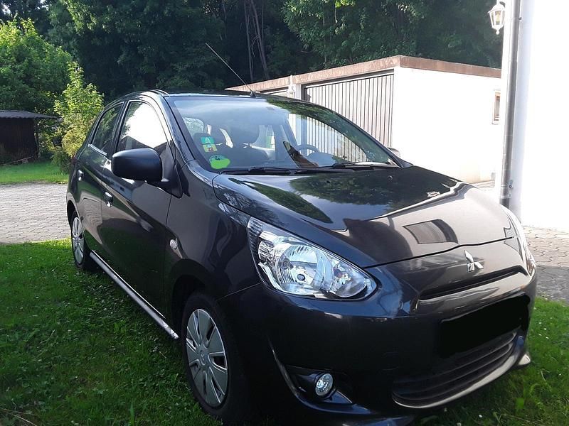 Grau Gebraucht 2014 Mitsubishi Space Star Kleinwagen | 3.500 € (Fairer Preis) - Bild 1/4