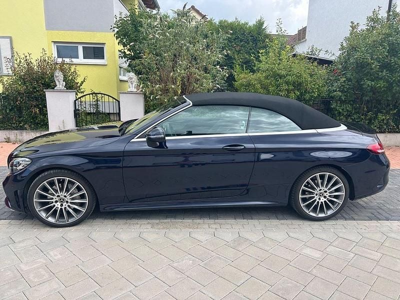 Blau Gebraucht 2022 Mercedes C200 AMG line Cabrio | 37.390 € (Superpreis) - Bild 1/2