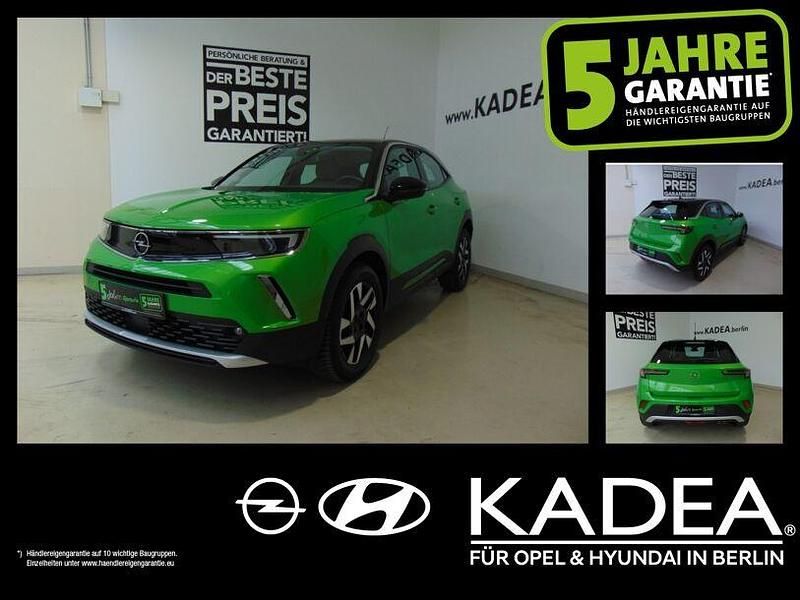 Lackierung matcha green/typ aussenverkle (metallic) Gebraucht 2023 Opel Mokka SUV | 18.390 € (Guter Preis) - Bild 1/4