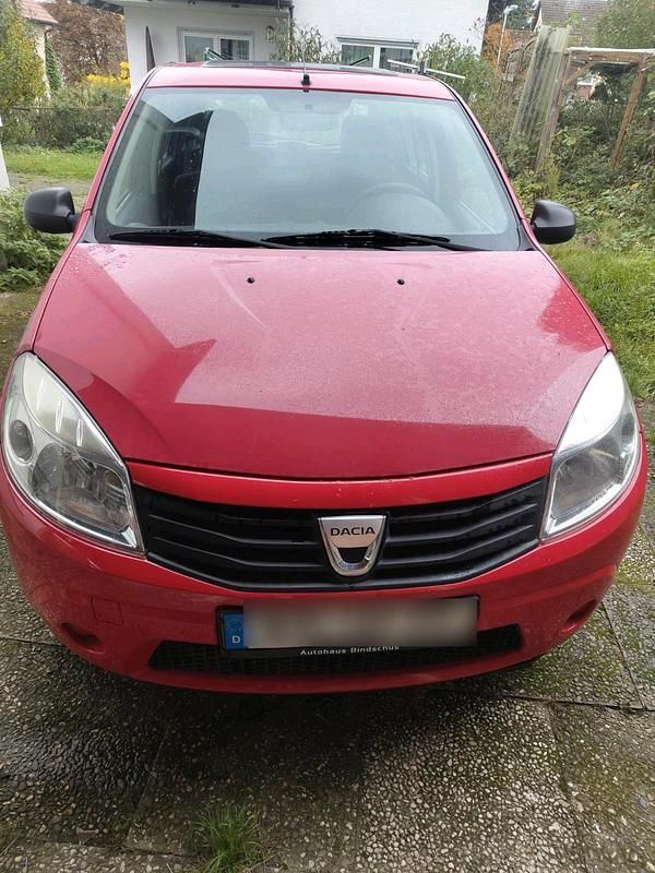 Rot Gebraucht 2009 Dacia Sandero Kleinwagen | 1.000 € (Superpreis) - Bild 1/4