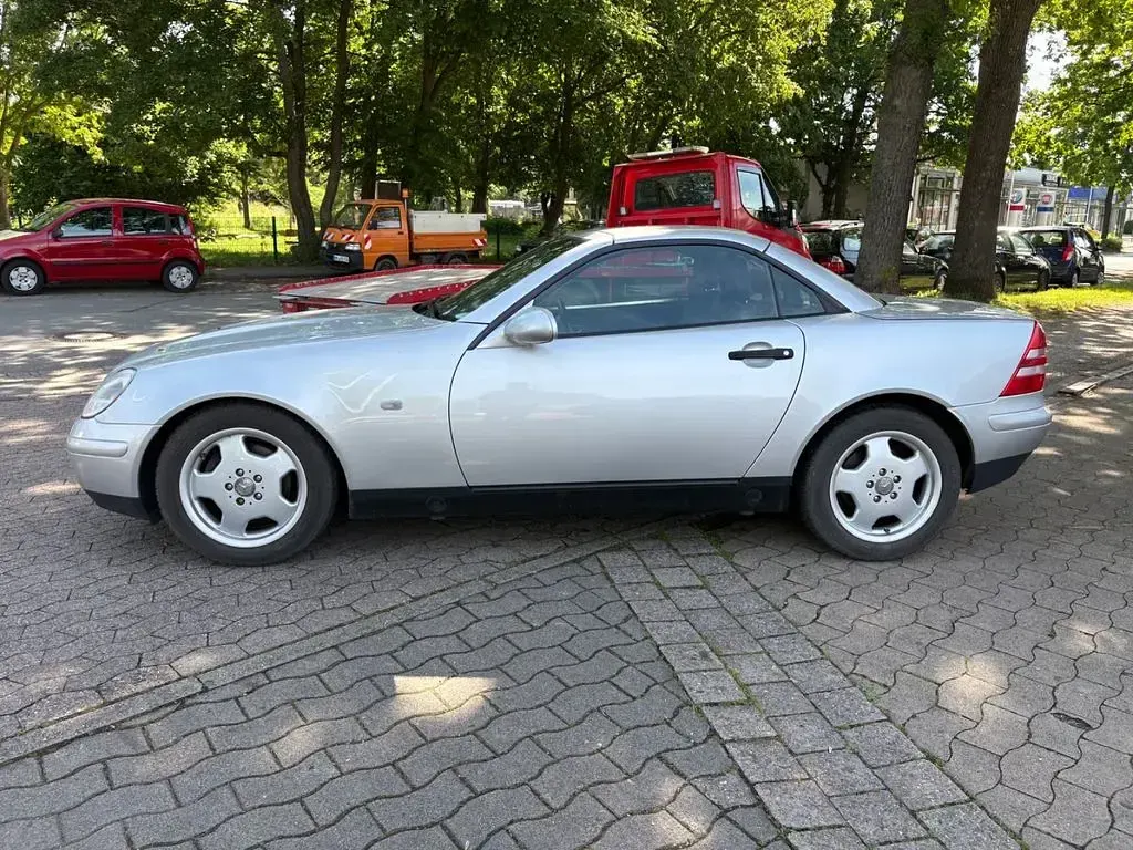 Gebraucht Mercedes SLK230 193 PS (141 kW) 1999 Silber Cabrio