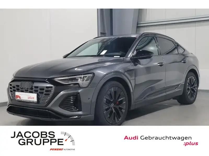 Grau Gebraucht 2023 Audi Q8 Sportback e-tron S-Line SUV | 64.979 € - Bild 1/4