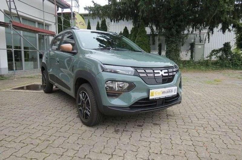 Gebraucht Dacia Spring Extreme 47 kW (65 PS) 2023 Grün "flechtengrau" Kleinwagen
