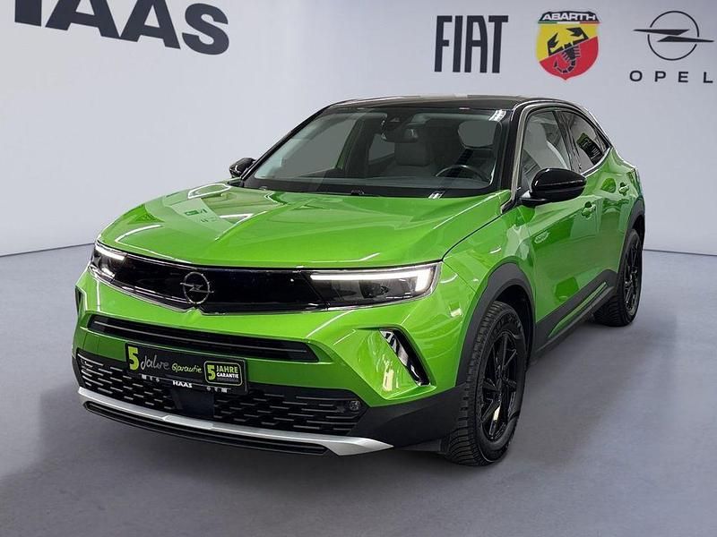 Gebraucht Opel Mokka-e Elegance 100 kW (136 PS) 2021 Matcha green/ikone gruen SUV