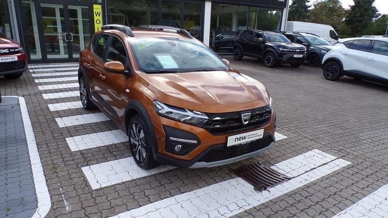 Orange atacama (metallic) Gebraucht 2022 Dacia Sandero Comfort Kleinwagen | 15.450 € (Guter Preis) - Bild 1/4