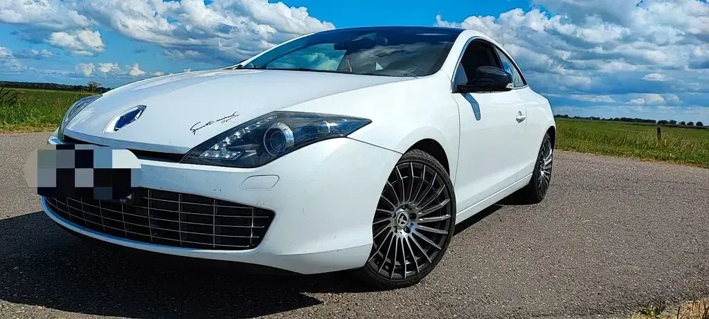 Gebraucht Renault Laguna III 173 PS (127 kW) 2012 Weiß Coupé