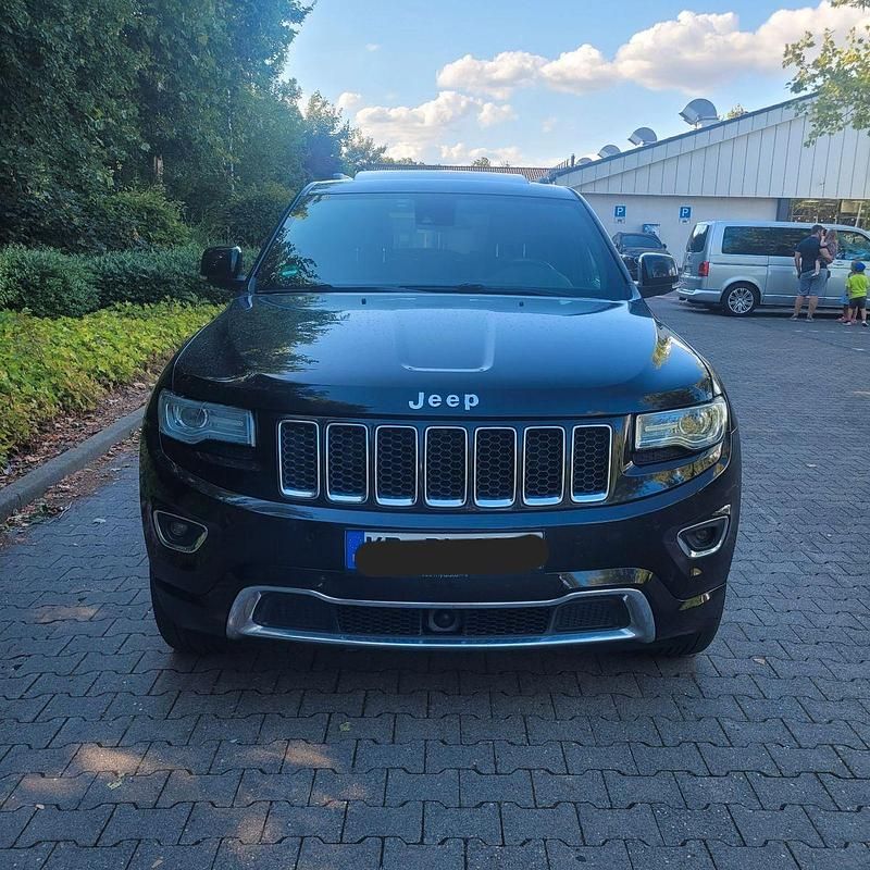 Schwarz Gebraucht 2013 Jeep Grand Cherokee Overland SUV | 11.999 € - Bild 1/4