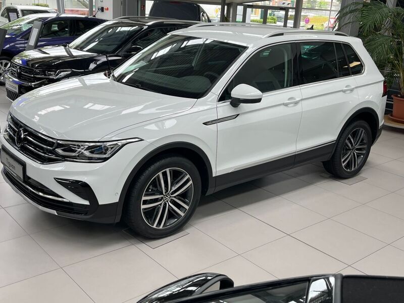 Pure white Gebraucht 2024 VW Tiguan Elegance SUV | 39.987 € (Fairer Preis) - Bild 1/4