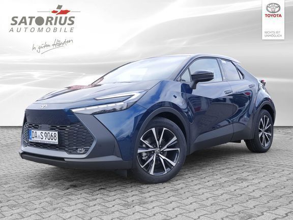 Midnight teal metallic/ dach schwarz Gebraucht 2023 Toyota C-HR Team SUV | 37.790 € - Bild 1/4