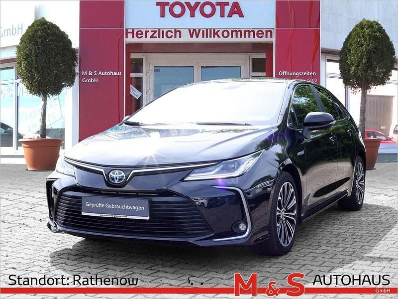 Mysticschwarz mica Gebraucht 2020 Toyota Corolla Team Limousine | 21.990 € (Fairer Preis) - Bild 1/4
