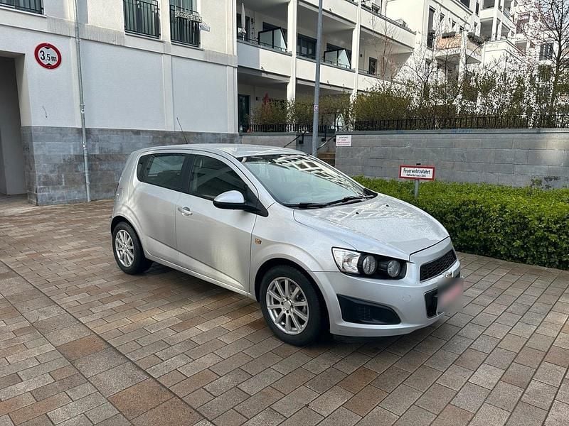 Gebraucht Chevrolet Aveo 101 PS (74 kW) 2012 Silber Limousine