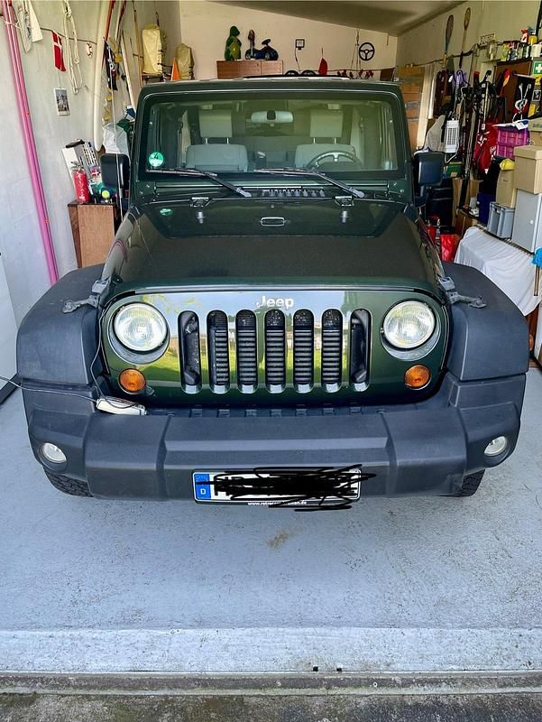 Grün Gebraucht 2010 Jeep Wrangler Rubicon SUV | 27.500 € (Fairer Preis) - Bild 1/4