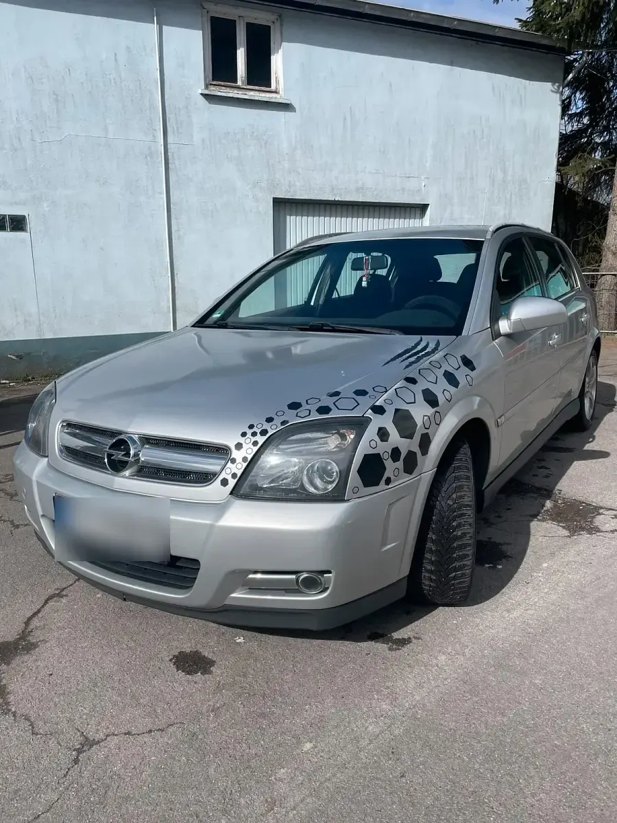 Second-hand Opel Signum 155 CP (114 kW) 2004 Argintiu Hatchback