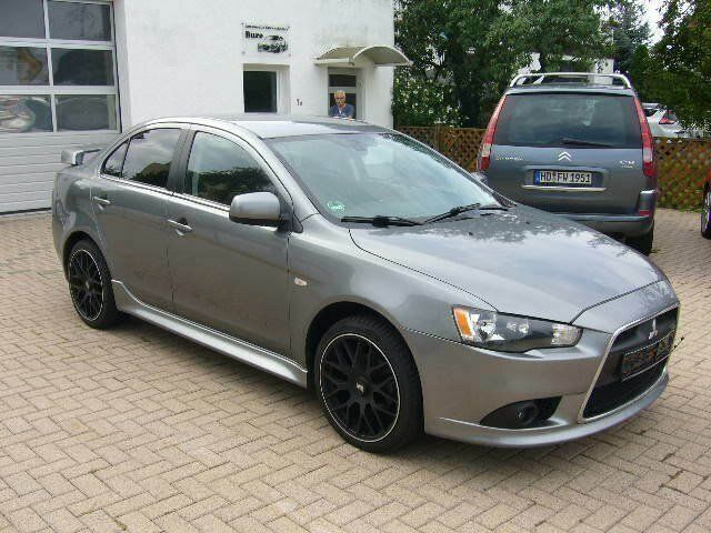 Gebraucht Mitsubishi Lancer 116 PS (85 kW) 2014 Grau metallic Limousine
