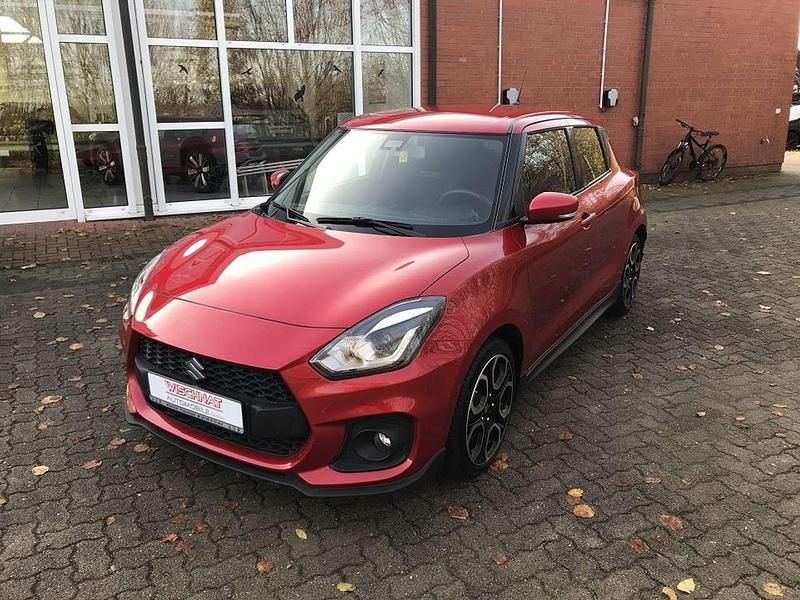 Burning red pearl met. Gebraucht 2022 Suzuki Swift Sport Kleinwagen | 18.590 € (Fairer Preis) - Bild 1/4