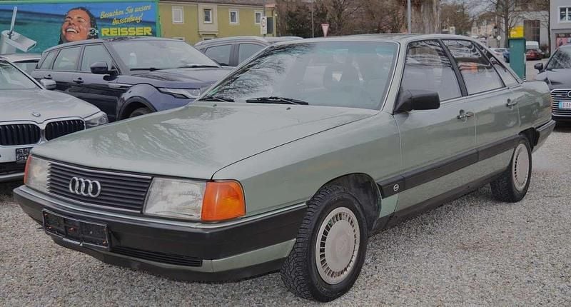 Topasgrün metallic Gebraucht 1984 Audi 100 Limousine | 1.950 € - Bild 1/4
