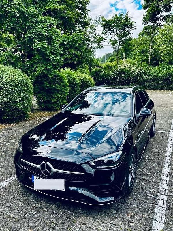 Schwarz Gebraucht 2022 Mercedes C200 AMG line Kombi | 32.900 € (Fairer Preis) - Bild 1/4
