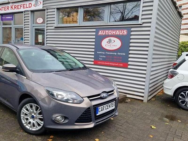 Brisbane brown/lunar sky Gebraucht 2011 Ford Focus Titanium Limousine | 5.200 € (Fairer Preis) - Bild 1/4