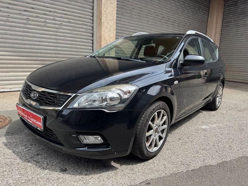 Schwarz Gebraucht 2011 Kia Ceed Sportswagon Vision Kombi | 7.595 € - Bild 1/4