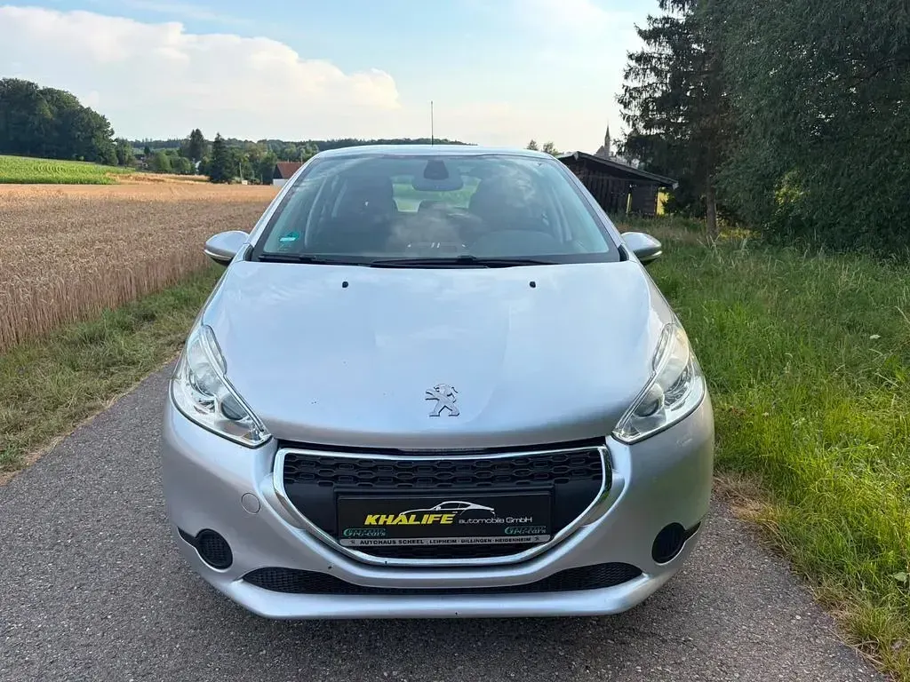 Gebraucht Peugeot 208 Active 99 PS (72 kW) 2015 Gris aluminium Kleinwagen