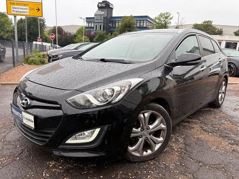 Schwarz Gebraucht 2013 Hyundai i30 Premium Kombi | 6.900 € (Fairer Preis) - Bild 1/4