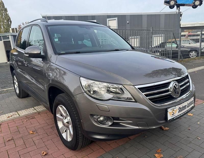 Grau Gebraucht 2009 VW Tiguan Track & Field SUV | 9.999 € (Fairer Preis) - Bild 1/4