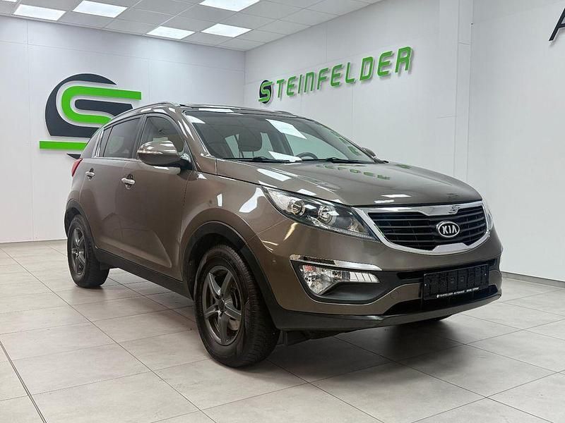 Braun Gebraucht 2012 Kia Sportage Attract SUV | 6.990 € (Fairer Preis) - Bild 1/4