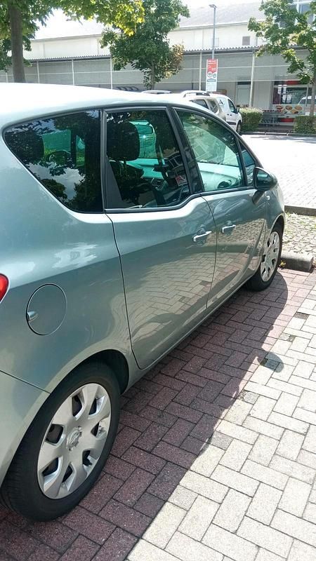 Gebraucht Opel Meriva 95 PS (69 kW) 2013 Grün Van / Kleinbus