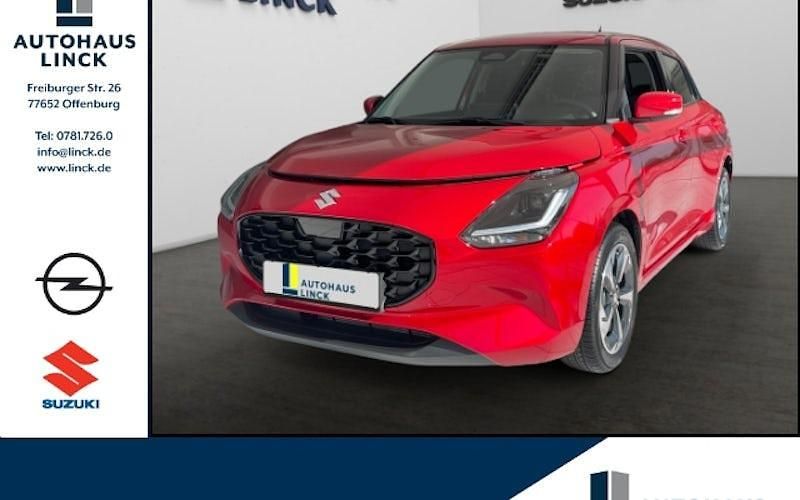Rot Neu 2025 Suzuki Swift Comfort+ Limousine | 21.488 € - Bild 1/4
