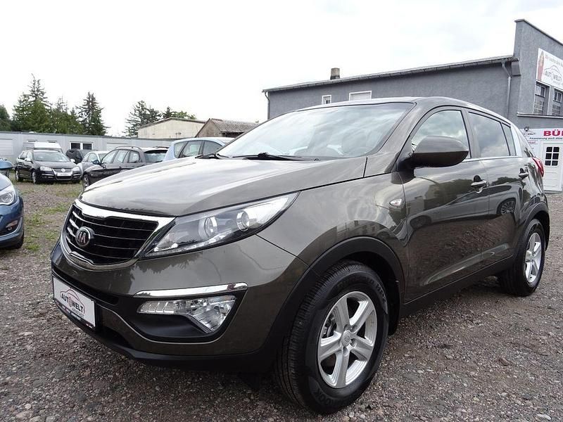 Grau Gebraucht 2014 Kia Sportage Attract SUV | 7.990 € (Fairer Preis) - Bild 1/4