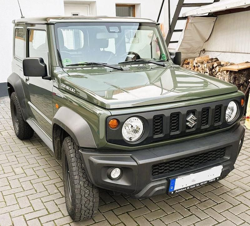 Grün Gebraucht 2018 Suzuki Jimny Comfort SUV | 22.900 € (Superpreis) - Bild 1/4