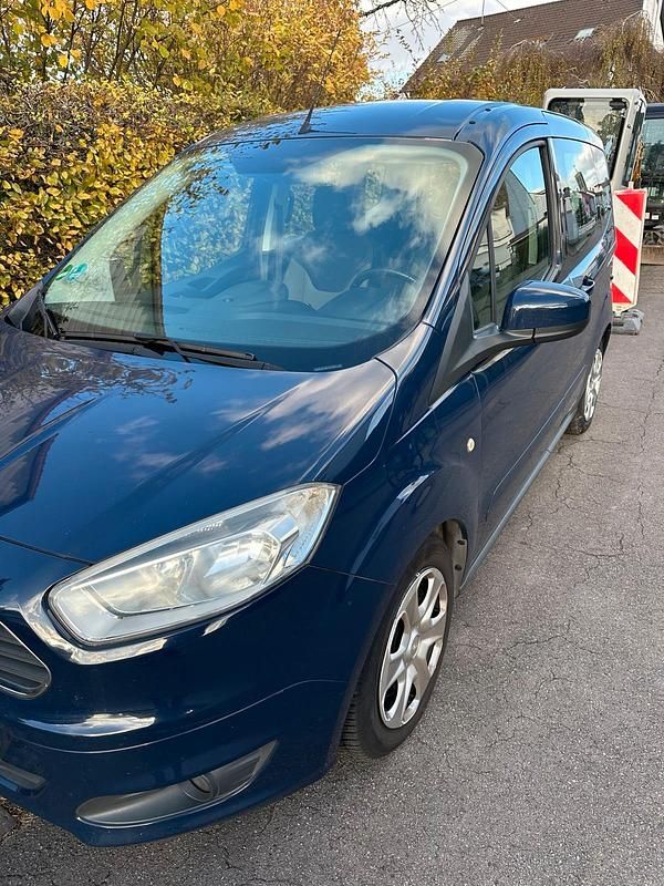 Blau Gebraucht 2015 Ford Tourneo Courier Van / Kleinbus | 5.200 € (Superpreis) - Bild 1/4