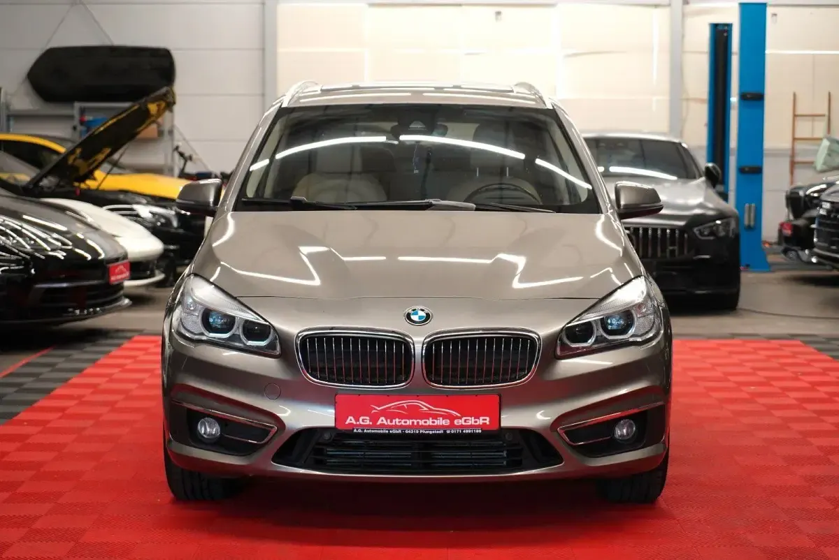 Gebraucht BMW 220 Gran Tourer Luxury Line 190 PS (139 kW) 2015 Gold Van / Kleinbus