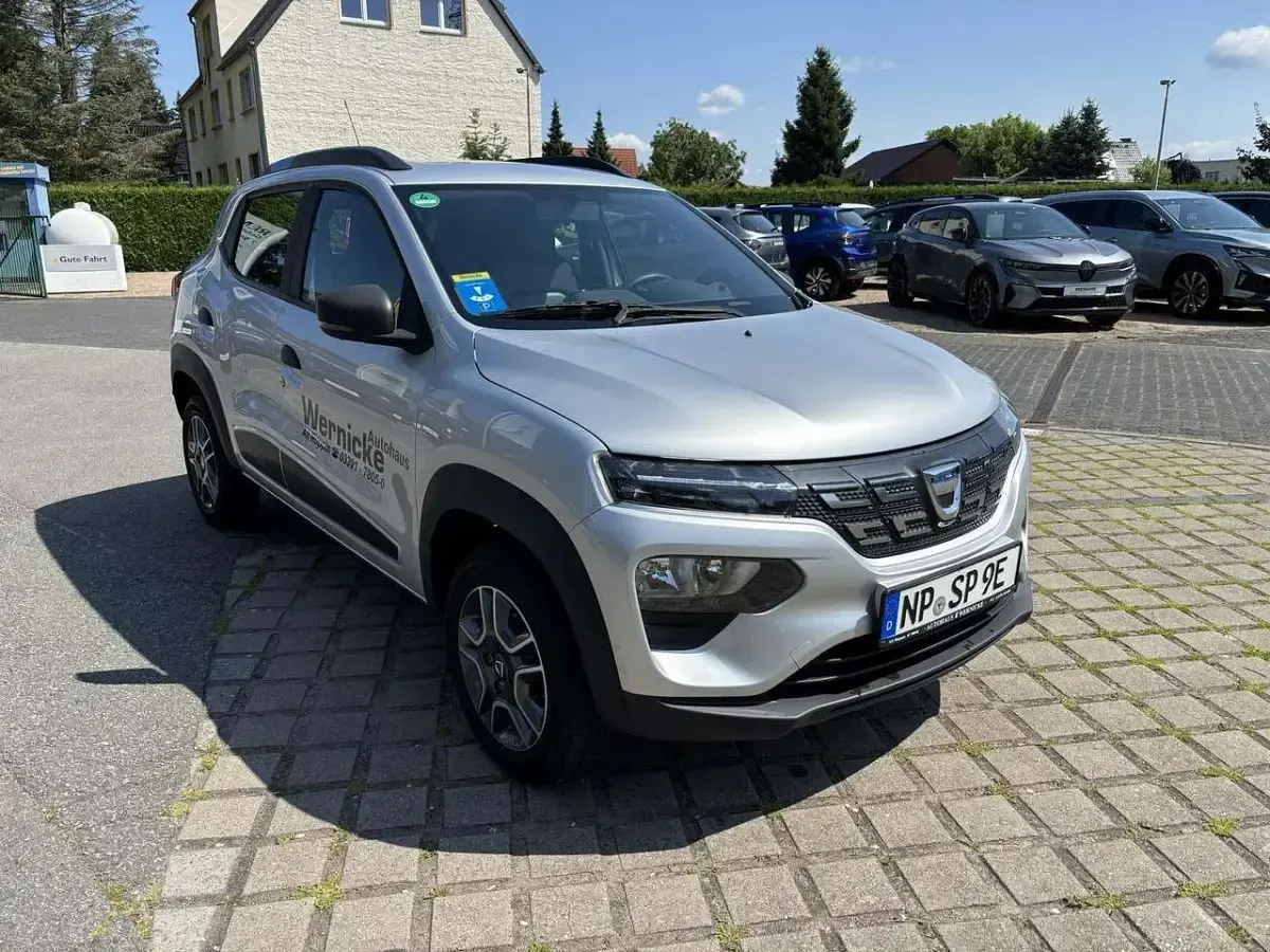 Gebraucht Dacia Spring Comfort 33 kW (45 PS) 2021 Diamantsilbergrau Kleinwagen