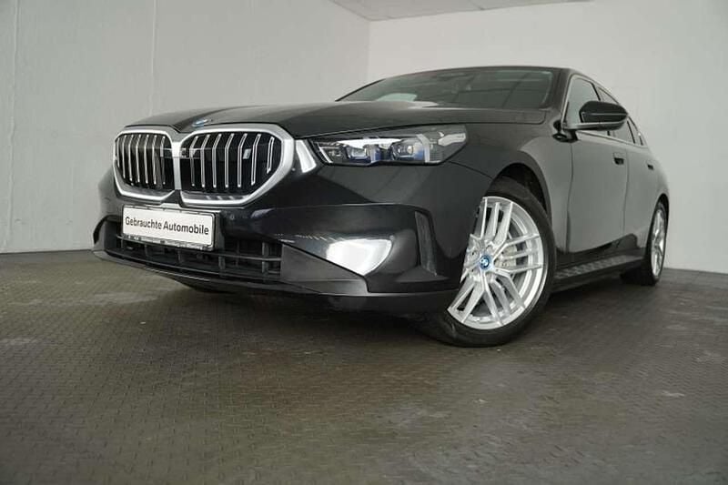 Gebraucht BMW i5 Performance 250 kW (340 PS) 2024 Black sapphire metallic Limousine