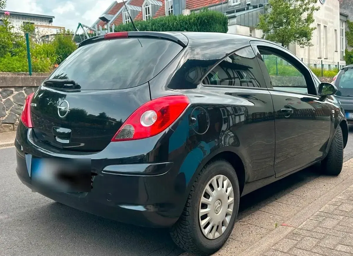 Gebraucht Opel Corsa 90 PS (66 kW) 2011 Schwarz Kleinwagen