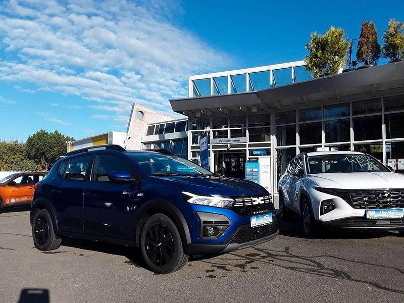 Gebraucht Dacia Sandero Expression 91 PS (66 kW) 2024 Iron blue metallic Kleinwagen