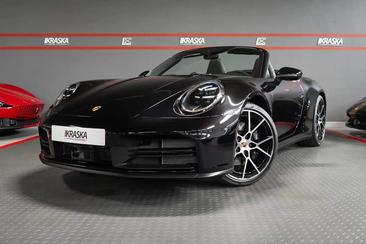 Gebraucht Porsche 911 Carrera Chrono 394 PS (289 kW) 2024 Tiefschwarzmetallic Cabrio