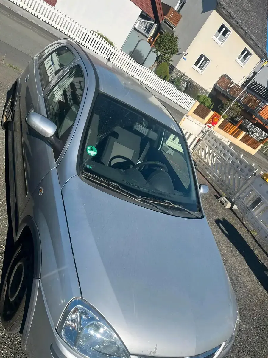 Second-hand Opel Corsa 75 CP (55 kW) 2004 Argintiu Hatchback