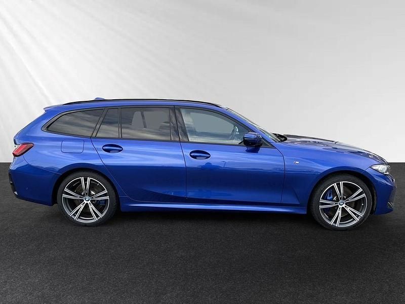 Gebraucht BMW 330e M Sport 292 PS (214 kW) 2024 Portimao blau metallic Kombi