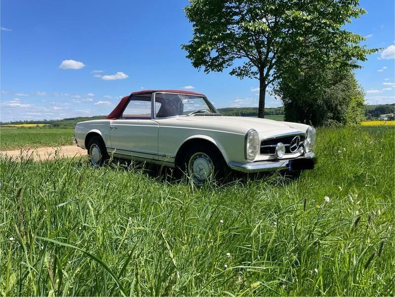 Weiß Gebraucht 1965 Mercedes W113 Cabrio | 42.500 € - Bild 1/4
