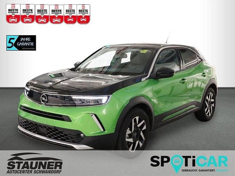 Grün Gebraucht 2023 Opel Mokka-e Elegance SUV | 17.480 € (Superpreis) - Bild 1/4