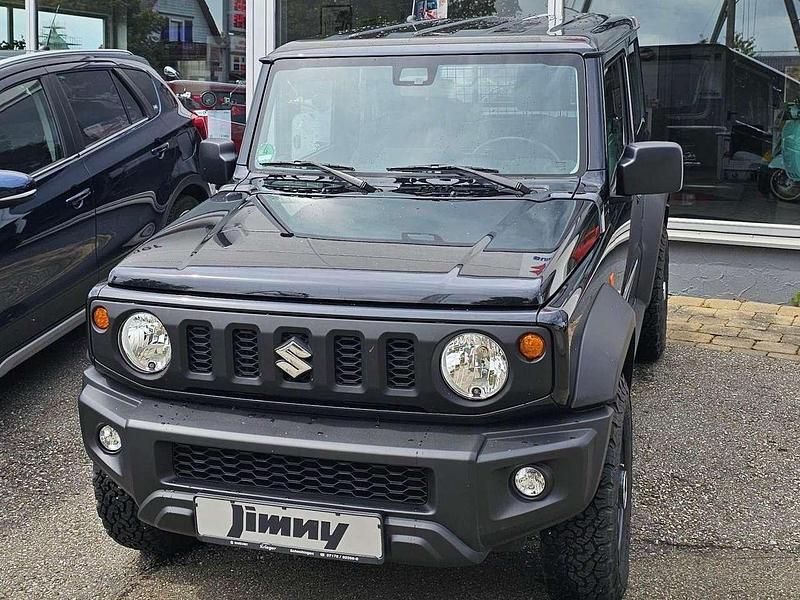 Bluish black pearl Gebraucht 2024 Suzuki Jimny Comfort SUV | 30.590 € (Teuer) - Bild 1/4