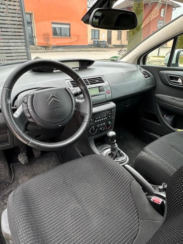 Second-hand Citroën C4 150 CP (110 kW) 2010 Alb Coupe