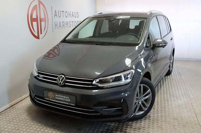 Grau Gebraucht 2024 VW Touran R-line Van / Kleinbus | 42.690 € (Teuer) - Bild 1/4