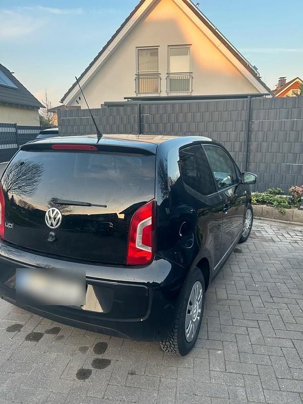 Używany VW up! 60 KM (44 kW) 2012 Czarny Hatchback