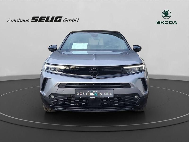 Gebraucht Opel Mokka 131 PS (96 kW) 2025 Silbermetallic SUV