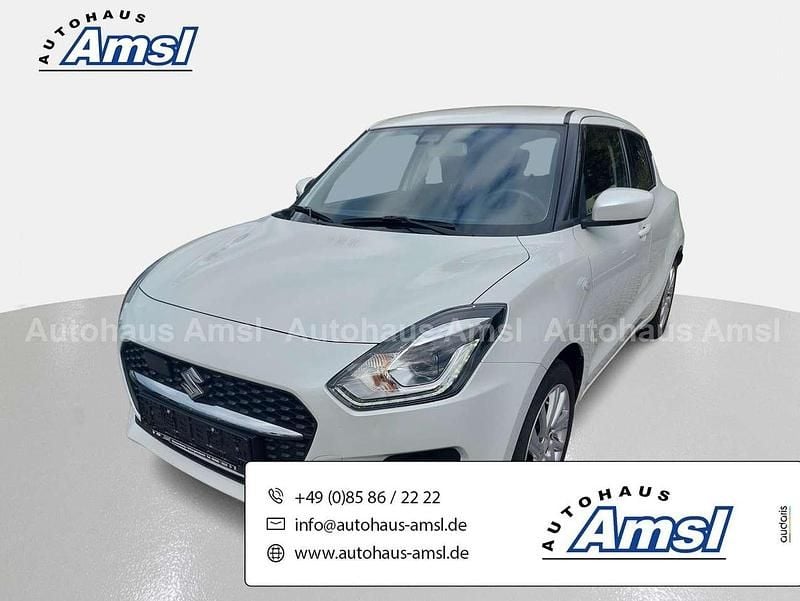 Pure white pearl Gebraucht 2021 Suzuki Swift Comfort Limousine | 11.890 € (Guter Preis) - Bild 1/4